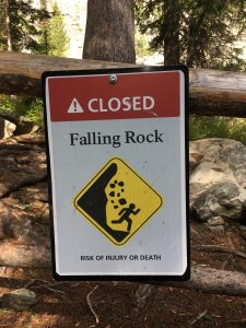 "Closed - Falling Rock" sign